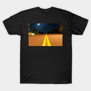 Yellow road lines stretch ahead in night light T-Shirt